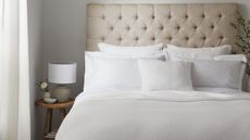 The White Company textured Colville Bedspread on bed frame in neutral bedroom