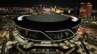 A nighttime drone shot of Allegiant Stadium in WWE's WrestleMania 41 announcement video.