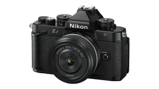 Nikon Z f with Z 28mm f/2.8 SE lens on white background