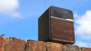 The best DAB radio Ruark Audio R1 Mk4 on a brick wall with a blue sky in the background