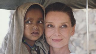 British actress and humanitarian Audrey Hepburn (1929 - 1993) with an Ethiopian girl on her first field mission for UNICEF in Ethiopia, 16th-17th March 1988
