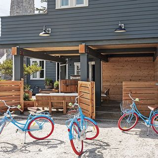 exterior of house with cycle and wooden gate