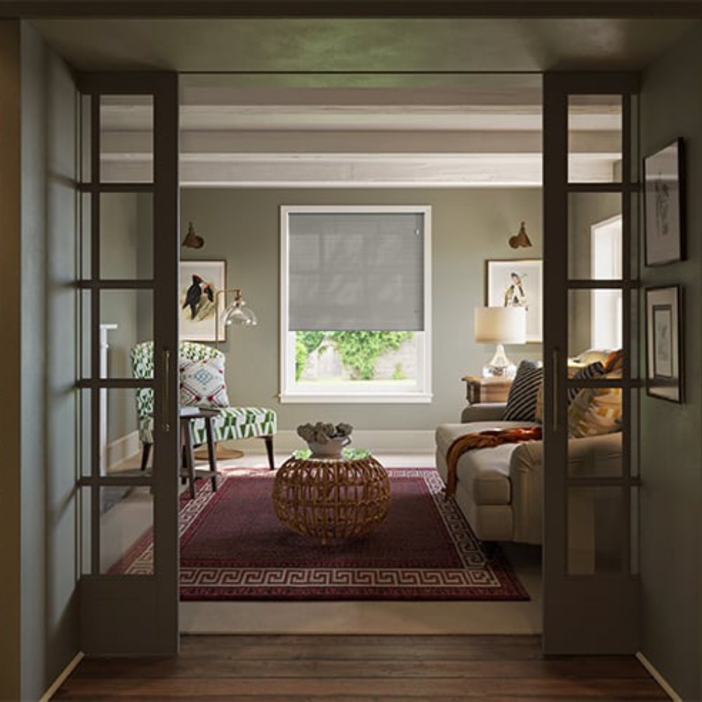 living room seen through open pocket glass doors with grey blind in window