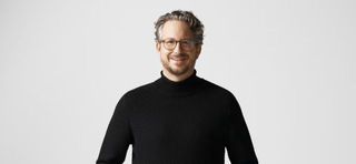 Smiling headshot of Daniel Sennheiser.