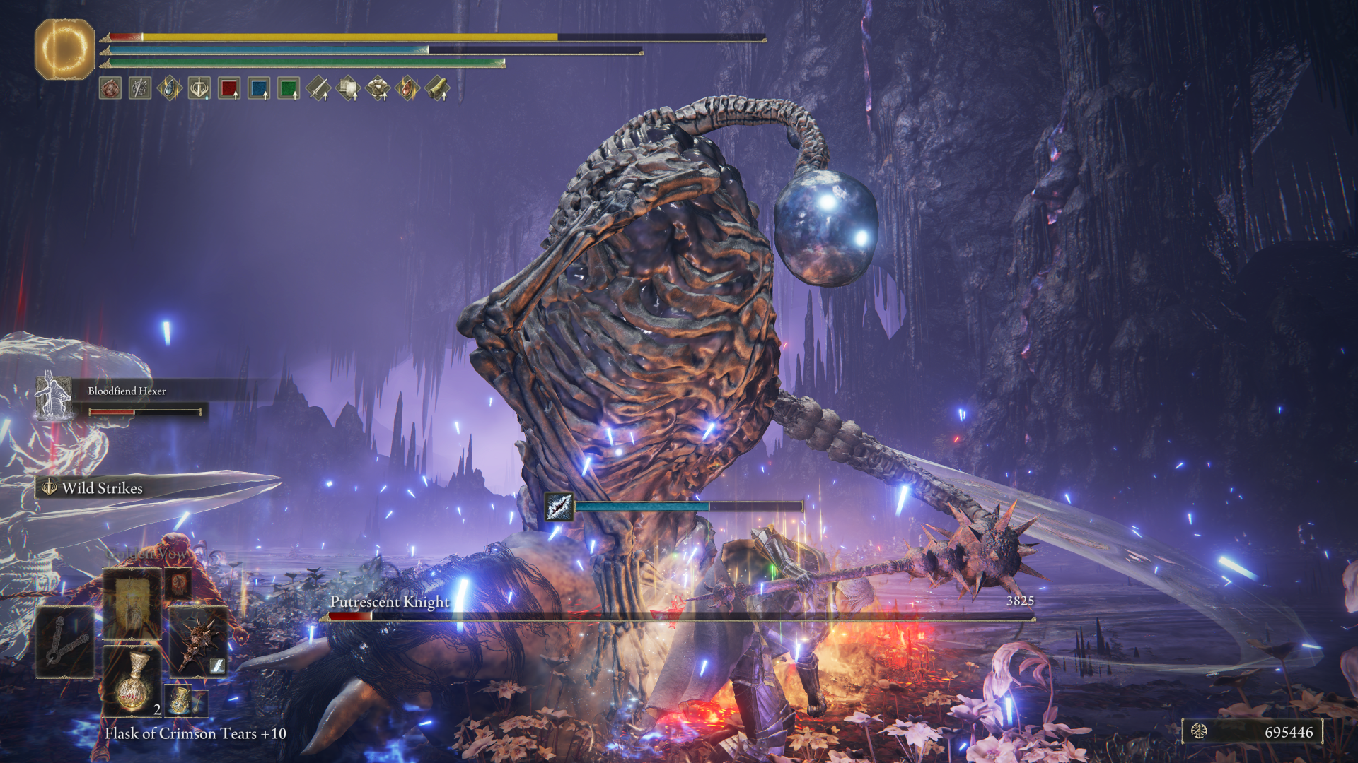 Elden Ring Shadow of the Erdtree screenshot of a character swinging a mace against a skeletal boss