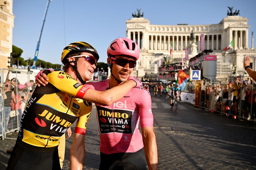 ROME ITALY MAY 28 LR Sepp Kuss of The United States and race winner Primo Rogli of Slovenia and Team JumboVisma Pink Leader Jersey react after the 106th Giro dItalia 2023 Stage 21 a 126km stage from Rome to Rome UCIWT on May 28 2023 in Rome Italy Photo by Fabio Ferrari PoolGetty Images