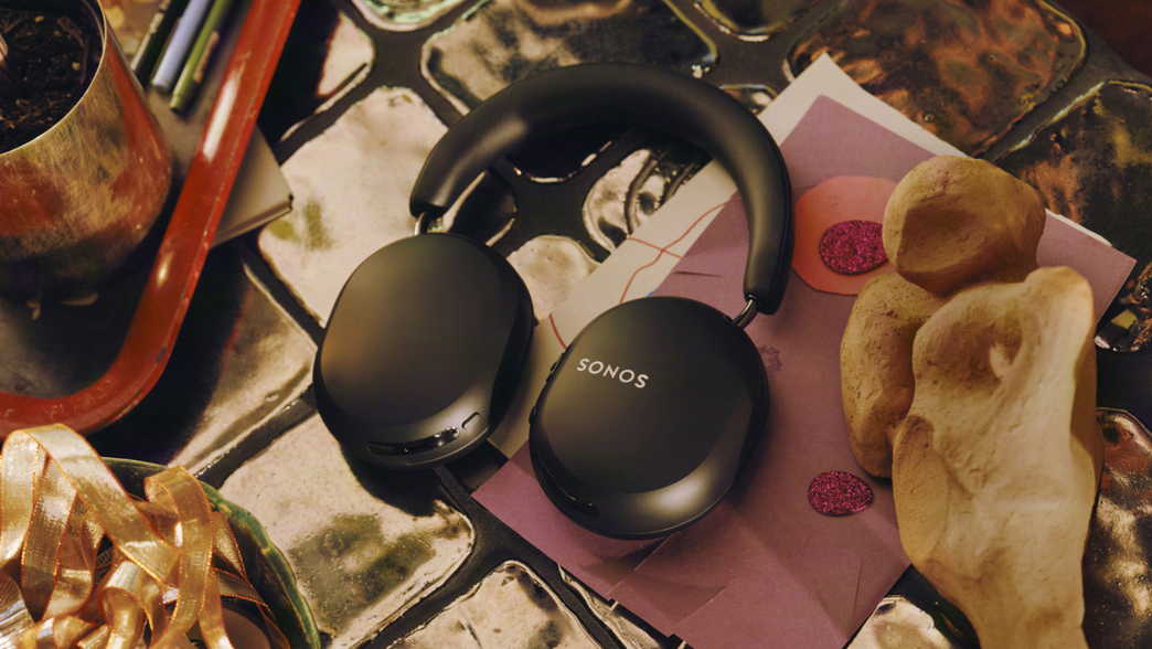 The Sonos Ace Ultra headphones on a desk