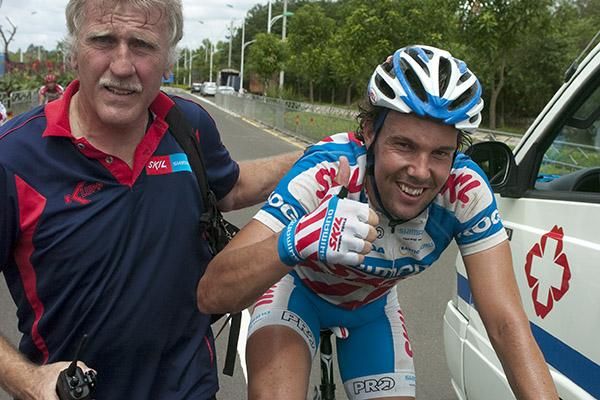 You beauty: Kenny Van Hummel (Skil-Shimano) from the Netherlands gives the thumbs-up to his stage win as he is escorted away