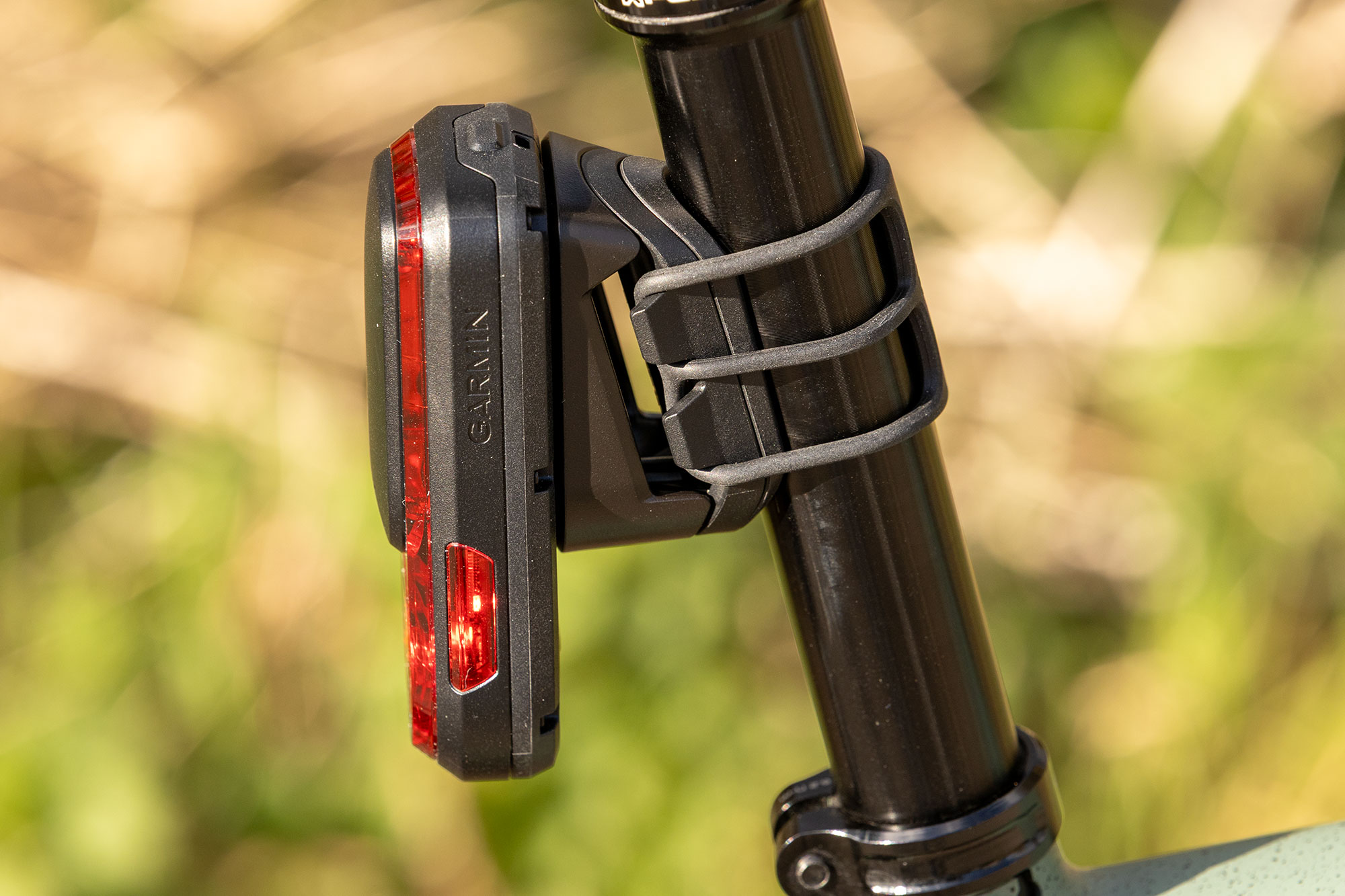 Garmin Varia RearVue 820 mounted on a seat post, pictured from the side