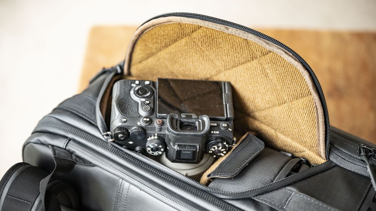 Side pocket open of the Gomatic McKinnon Camera Pack 35L