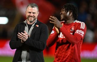 ABERDEEN, SCOTLAND - OCTOBER 30: Aberdeen manager Jimmy Thelin (L) and Peter Ambrose at full time during a William Hill Premiership match between Aberdeen and Rangers at Pittodrie Stadium, on October 30, 2024, in Aberdeen, Scotland. (Photo by Rob Casey/SNS Group via Getty Images)