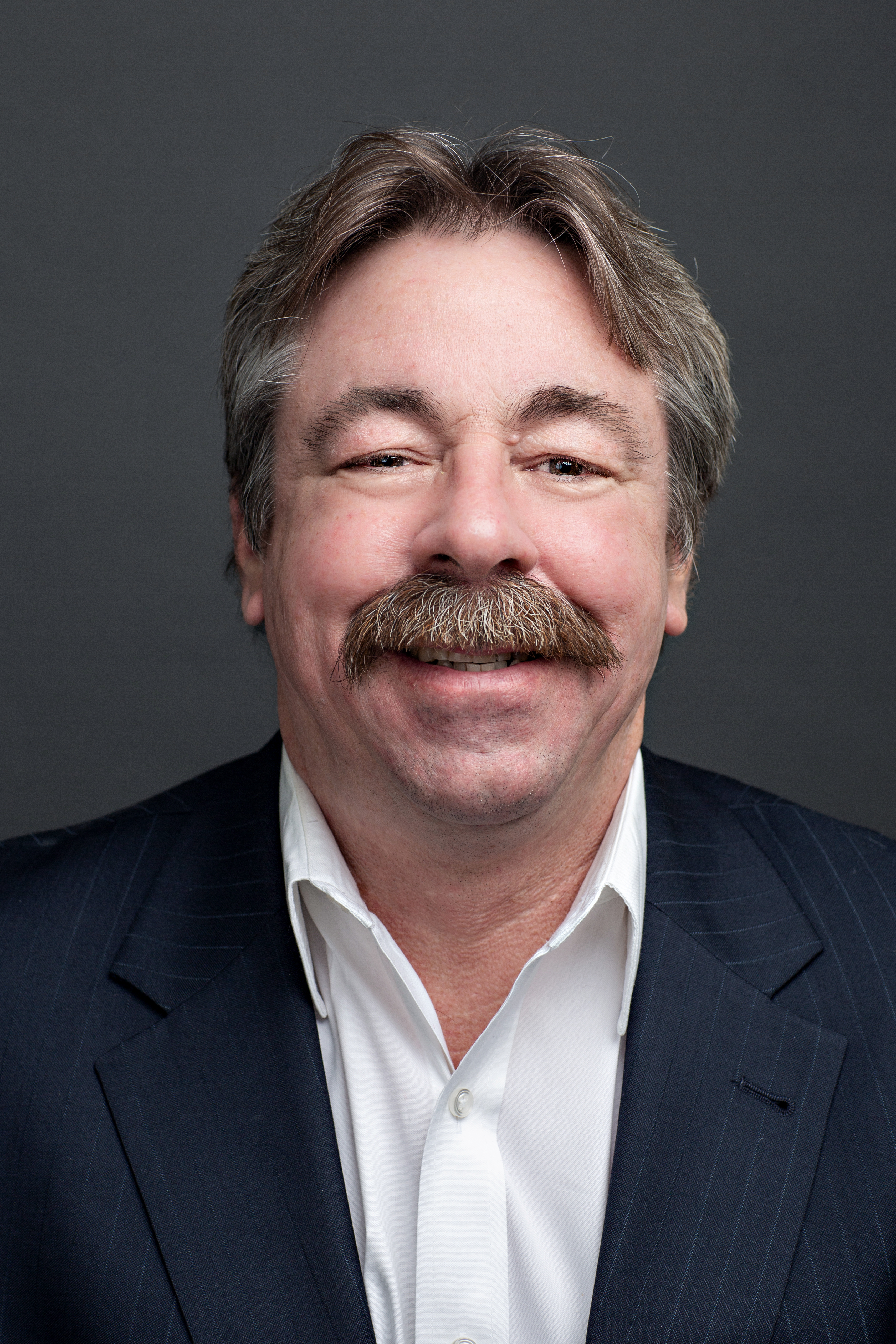 Headshot of Chris Wildfoerster.