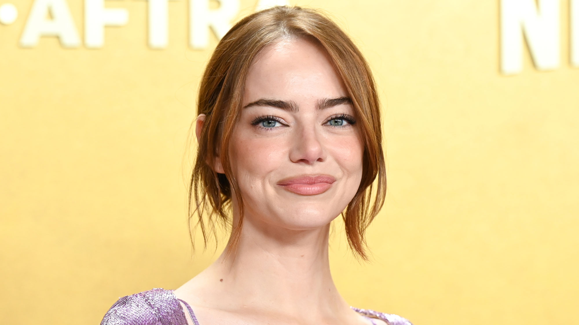 Emma Stone wears a lilac cardigan at the SAG Awards