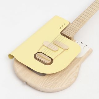 Yellow and pale wood Sine guitar by Verso Musical Instruments