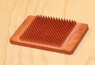Amulaire shows off their molded copper heatsinks.