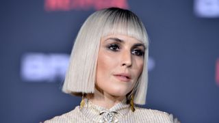 Noomi Rapace on the red carpet with a blonde box bob