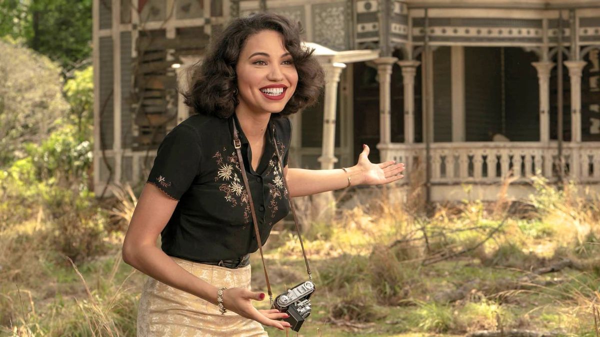 Letitia &quot;Leti&quot; Lewis (Jurnee Smollett) gestures excitedly in &quot;Holy Ghost.&quot;