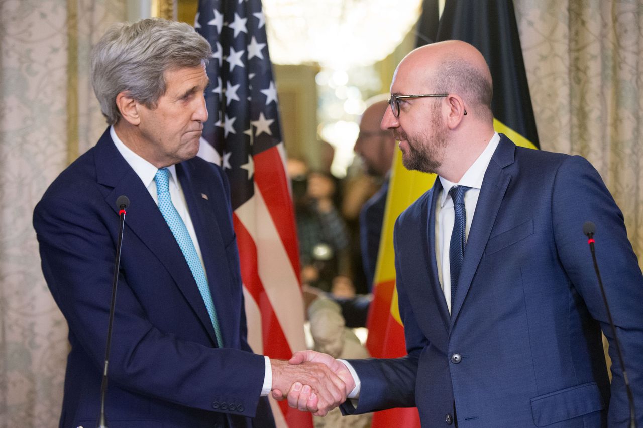 John Kerry shakes hands with Belgian Prime Minister Charles Michel