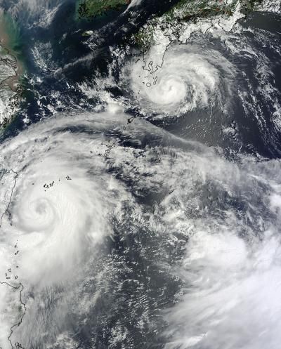 Typhoon Saola and Typhoon Damrey together in a satellite image