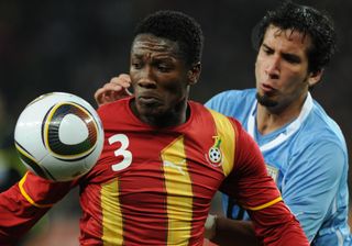 Asamoah Gyan in action for Ghana against Uruguay at the 2010 World Cup.