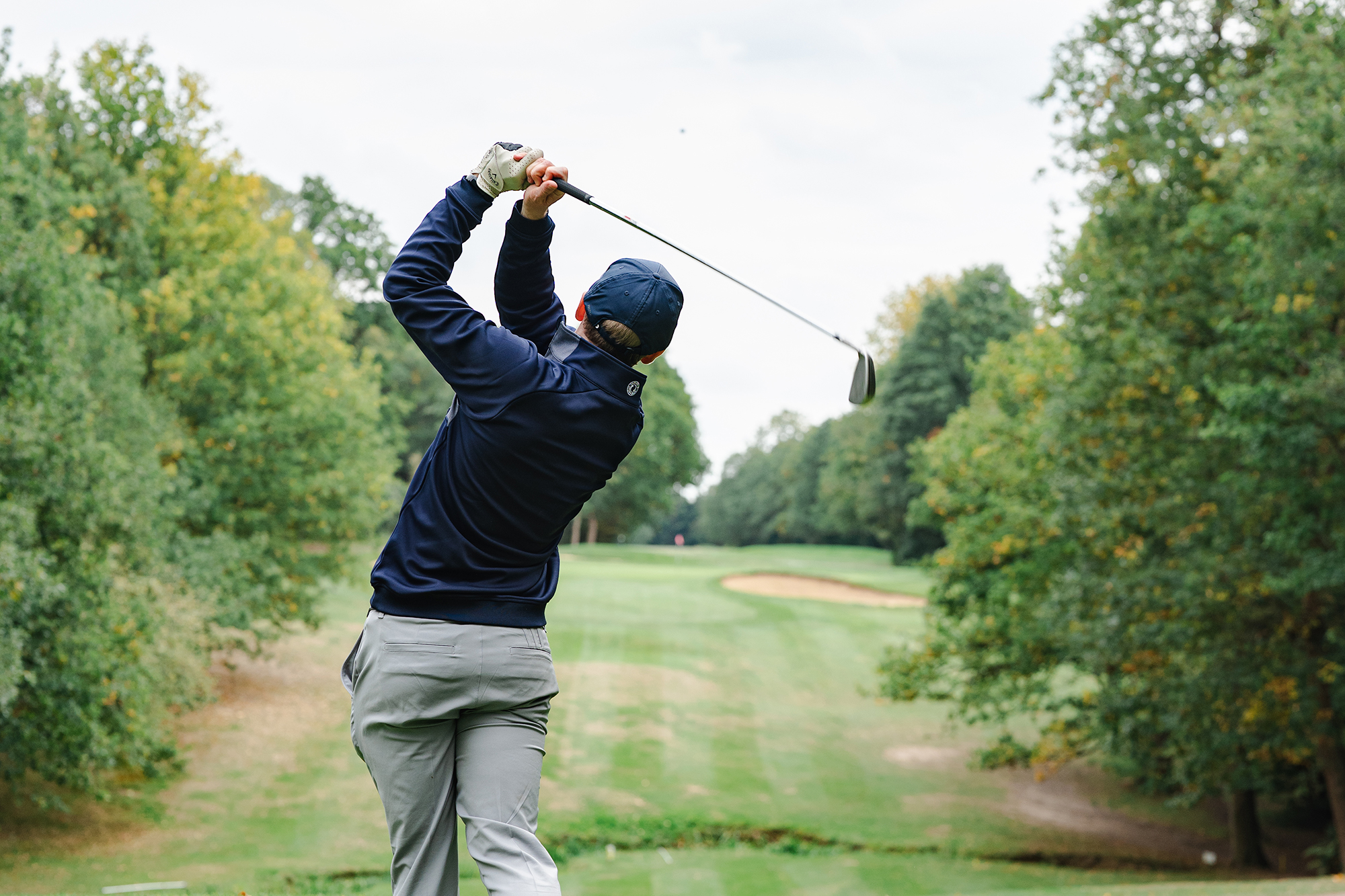 Jonny Leighfield in the finish position after hitting an iron into a par-3