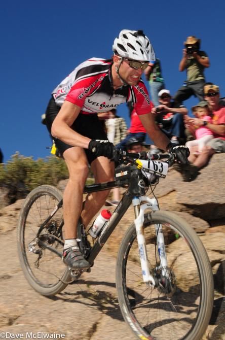An Area 51 team member riding near the front of the race