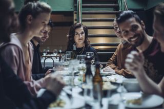 Before We Die: The Mimica family — and Christian — enjoy a family meal around the long table in their restaurant, with Dubravka sitting at the head of the table