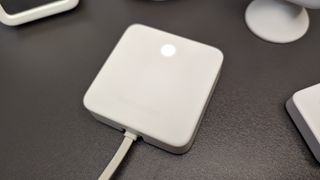 SwitchBot Smart Hub Mini on a table