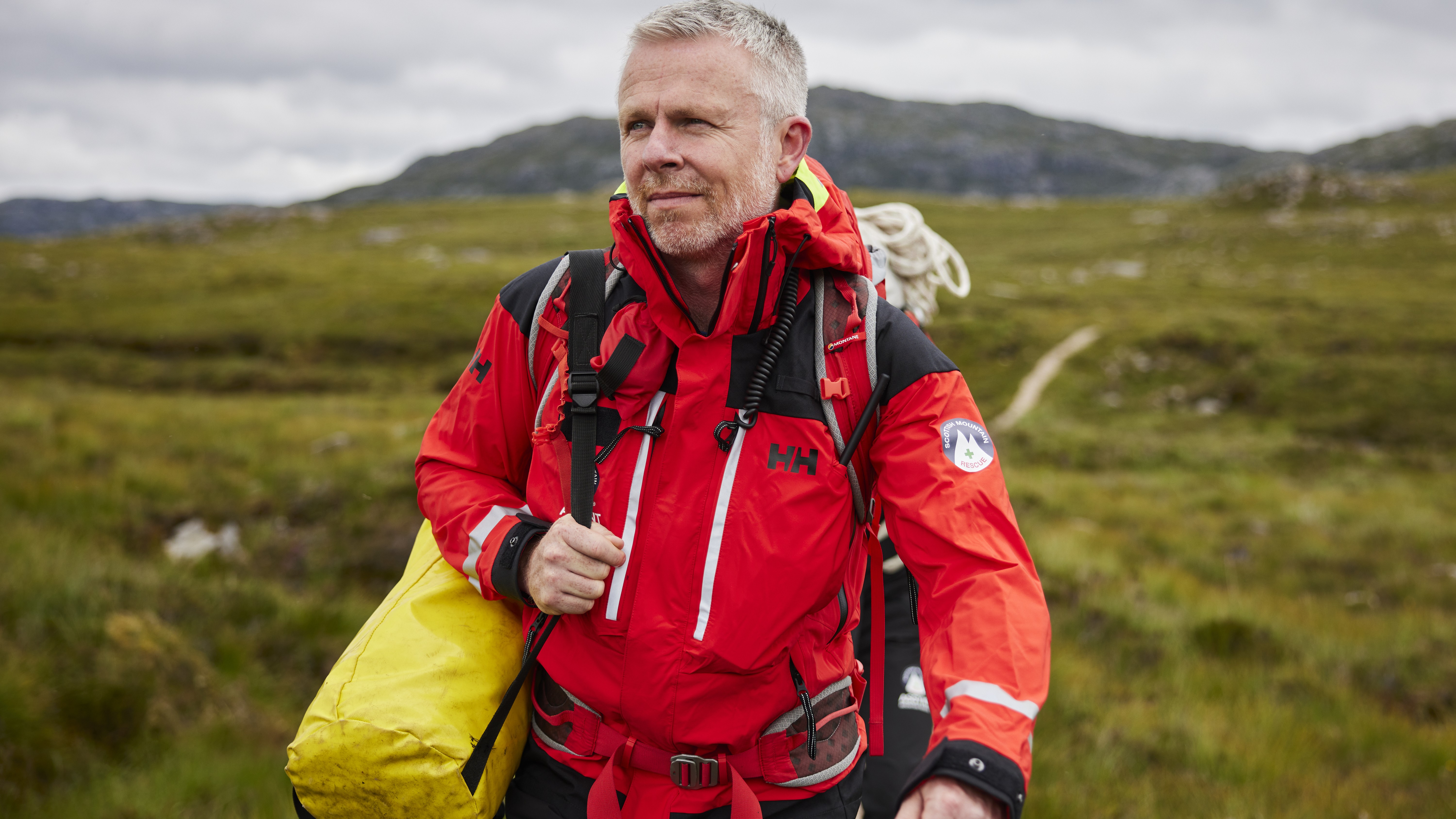 A team member from Assynt Mountain Rescue in the field