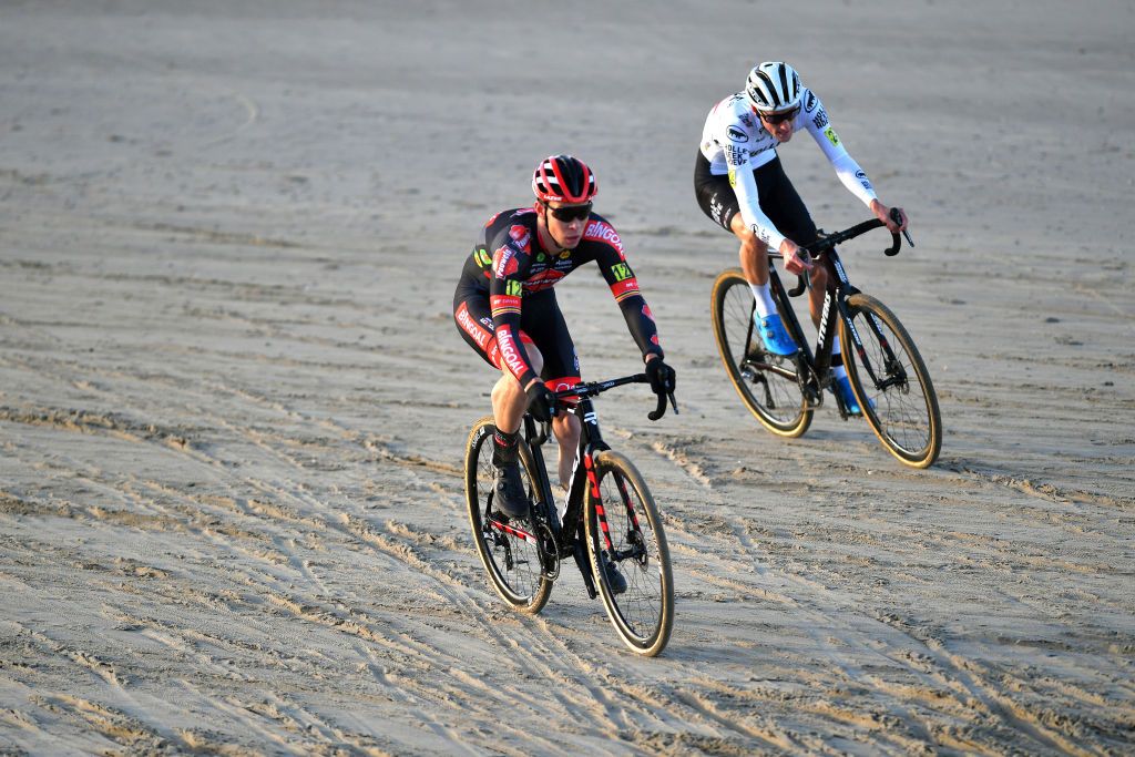 MIDDELKERKE BELGIUM JANUARY 09 LR Laurens Sweeck of Belgium and Jens Adams of Belgium compete during the 105th Belgian National Cyclocross Championships 2022 Mens Elite bkmiddelkerke on January 09 2022 in Middelkerke Belgium Photo by Luc ClaessenGetty Images