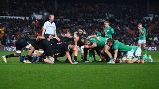 The Maori All Blacks and Ireland pack down for a scrum