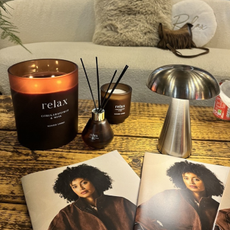 Home Style USB Mushroom Led Touch Lamp Silver on coffee table next to candles and magazine.