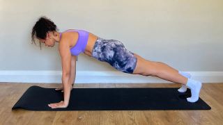 Jade demonstrating the 'up' position of the up and down plank
