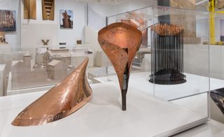 Beautifully sculpted in polished copper, each rod of Heatherwick's 2012 Olympic Games Cauldron was lit and elevated to form one united burning flame