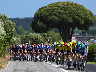 COSENZA, ITALY - MAY 12: A general view of the peloton competing during the 109th Giro d'Italia 2026, Stage 4 a 138km stage from Catanzaro to Cosenza / #UCIWT / on May 12, 2026 in Cosenza, Italy. (Photo by Tim de Waele/Getty Images)