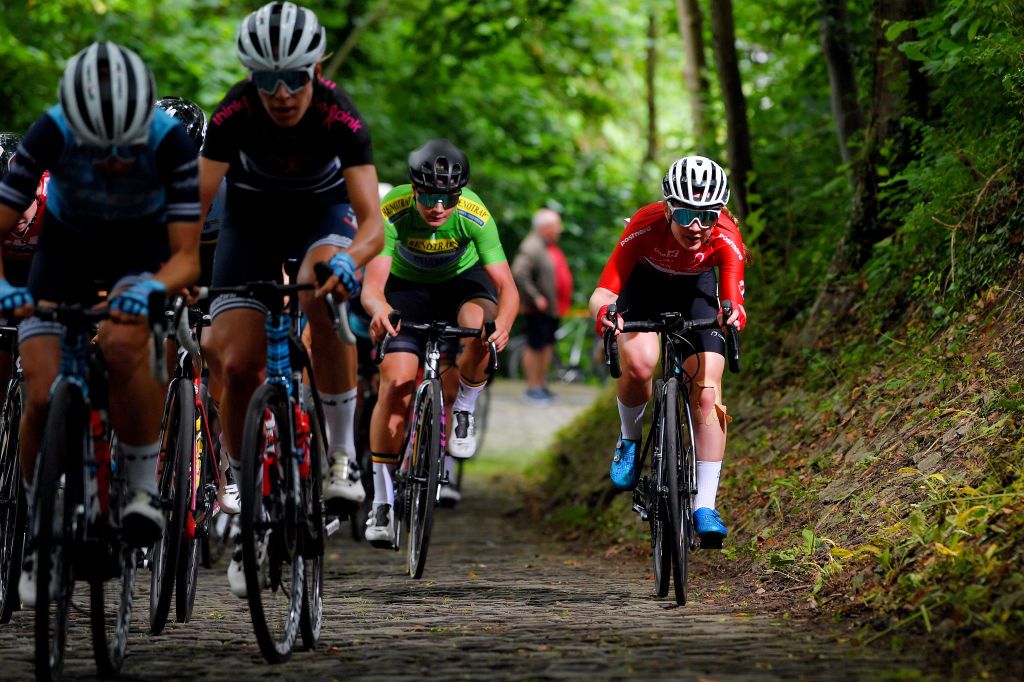 GERAARDSBERGEN BELGIUM JUNE 25 Lotte Kopecky of Belgium and Belgium National Team Green Points Jersey Anne Dorthe Ysland of Norway and Norway National Team passing through Muur van Geraardsbergen cobblestones sector during the 9th Lotto Belgium Tour 2021 Stage 3 a 1011km stage from Geraardsbergen to Geraardsbergen 101m MuurKapelmuur LottoBelgTour LottoBelgiumTour on June 25 2021 in Geraardsbergen Belgium Photo by Luc ClaessenGetty Images