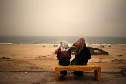 Palestinian girls at a Gaza Strip beachfront