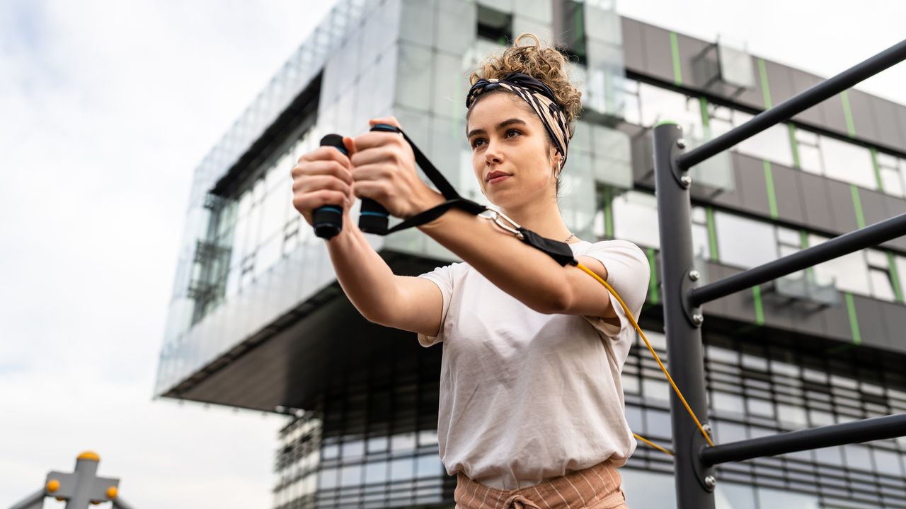 Woman exercising with a resistance band