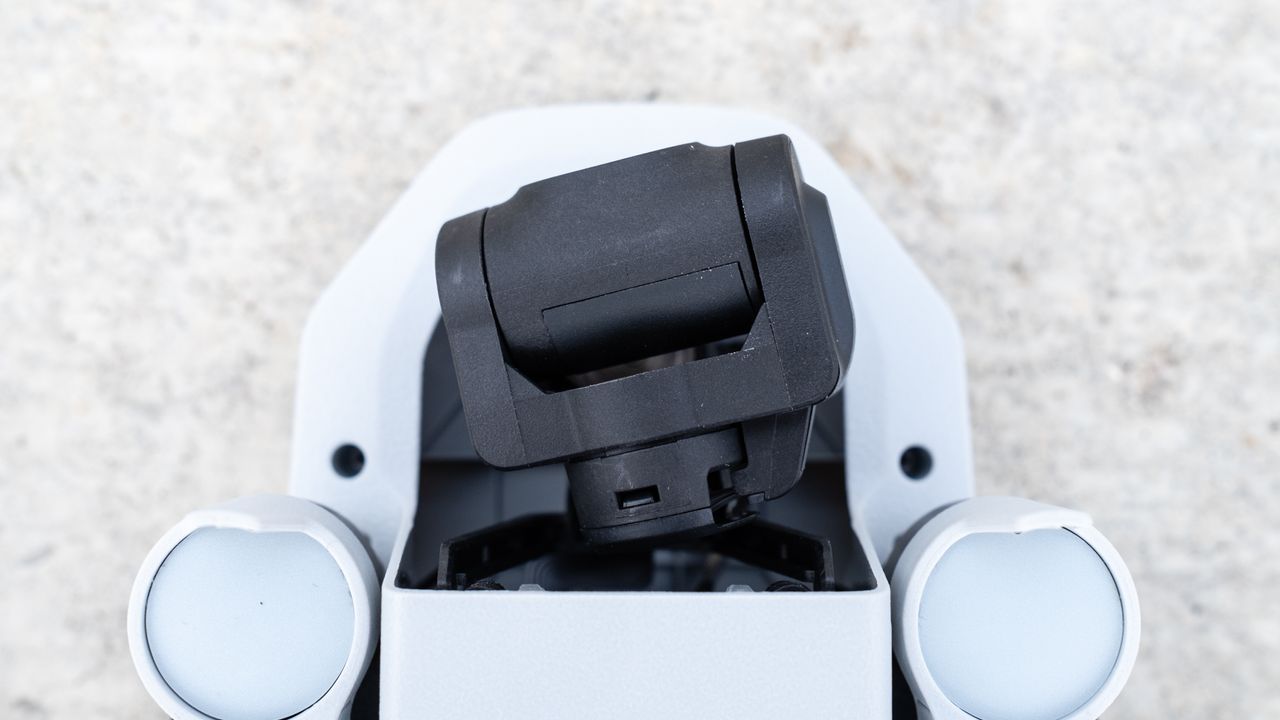 a top-down view of the black gimble of a drone camera.