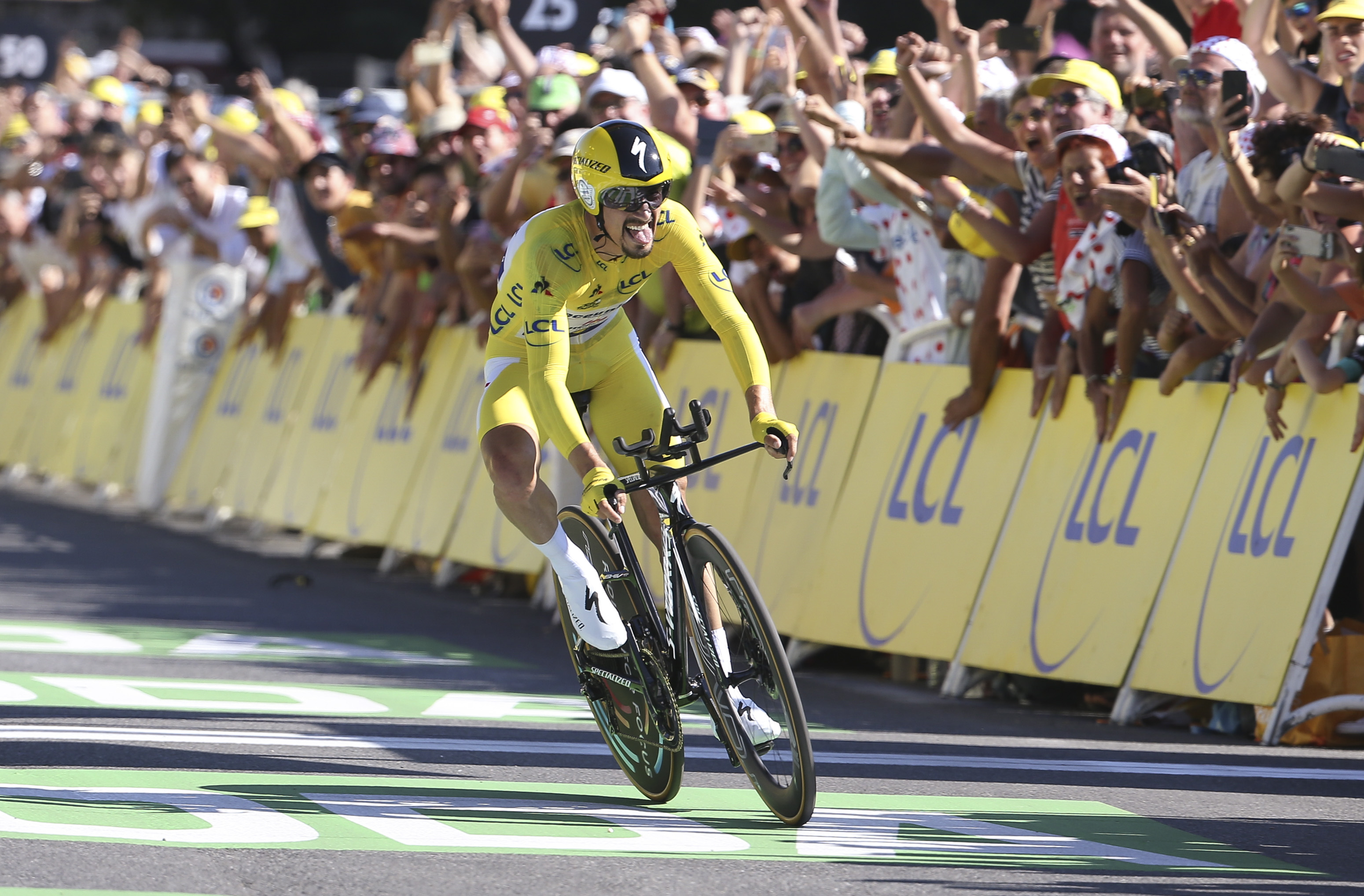 Julian Alaphilippe of France and Deceuninck-Quick Step crosses the finish line and wins stage 13 of the 106th Tour de France 2019, an individual time trial (contre la montre) between Pau and Pau of 27,2km on July 19, 2019 in Pau, France. (Photo by Jean Catuffe/Getty Images)