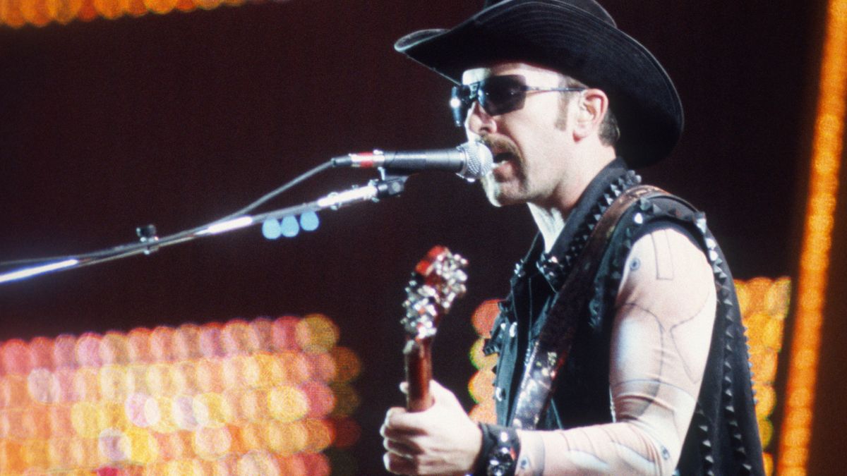 U2 in costumes designed by Walter Van Beirendonck, The Edge, Werchter Festival Grounds, Werchter, Belgium, 25 July 1997.