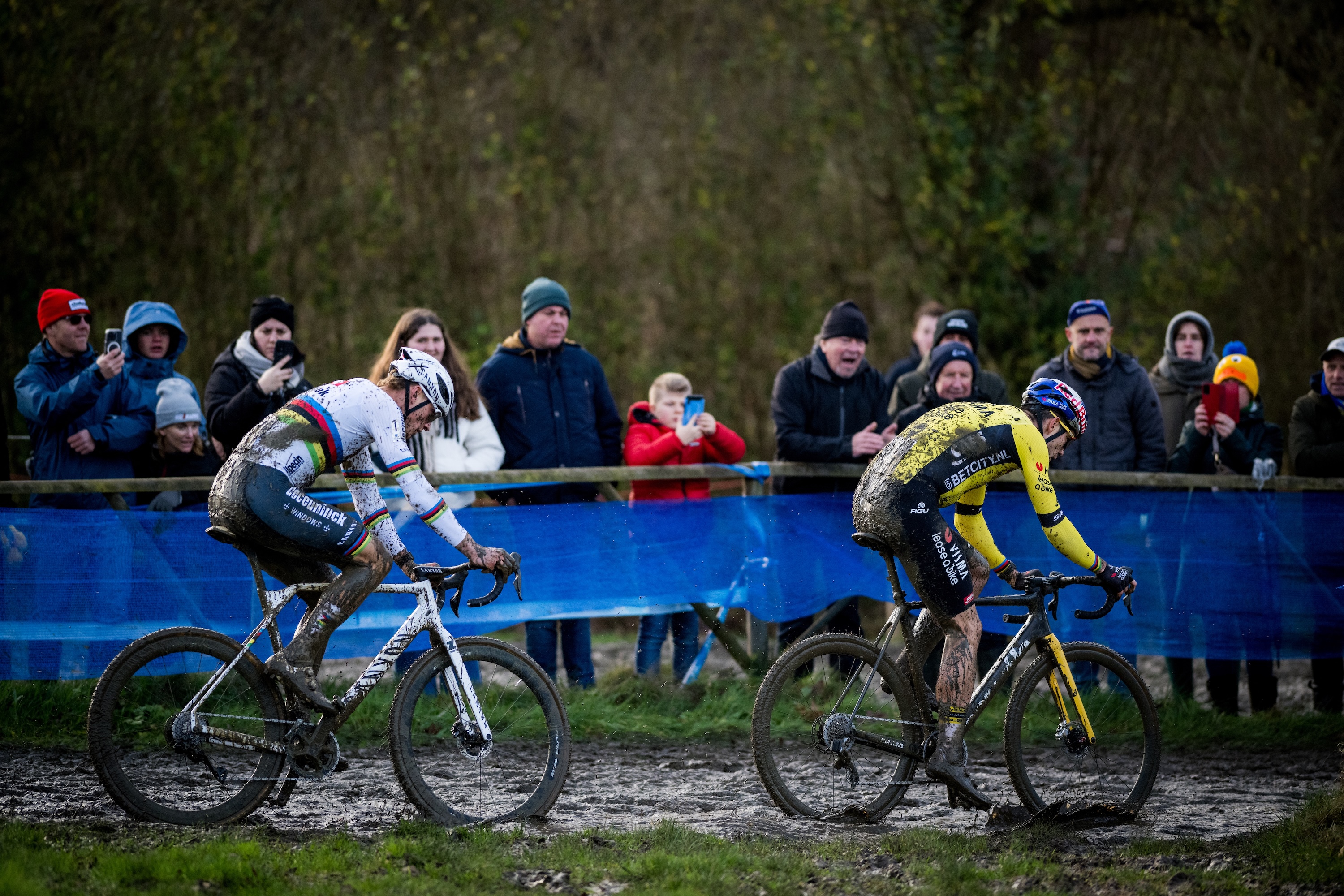 Wout van Aert and Mathieu van der Poel race on a cyclo-cross course