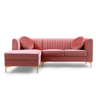 An L-shape pink velvet couch