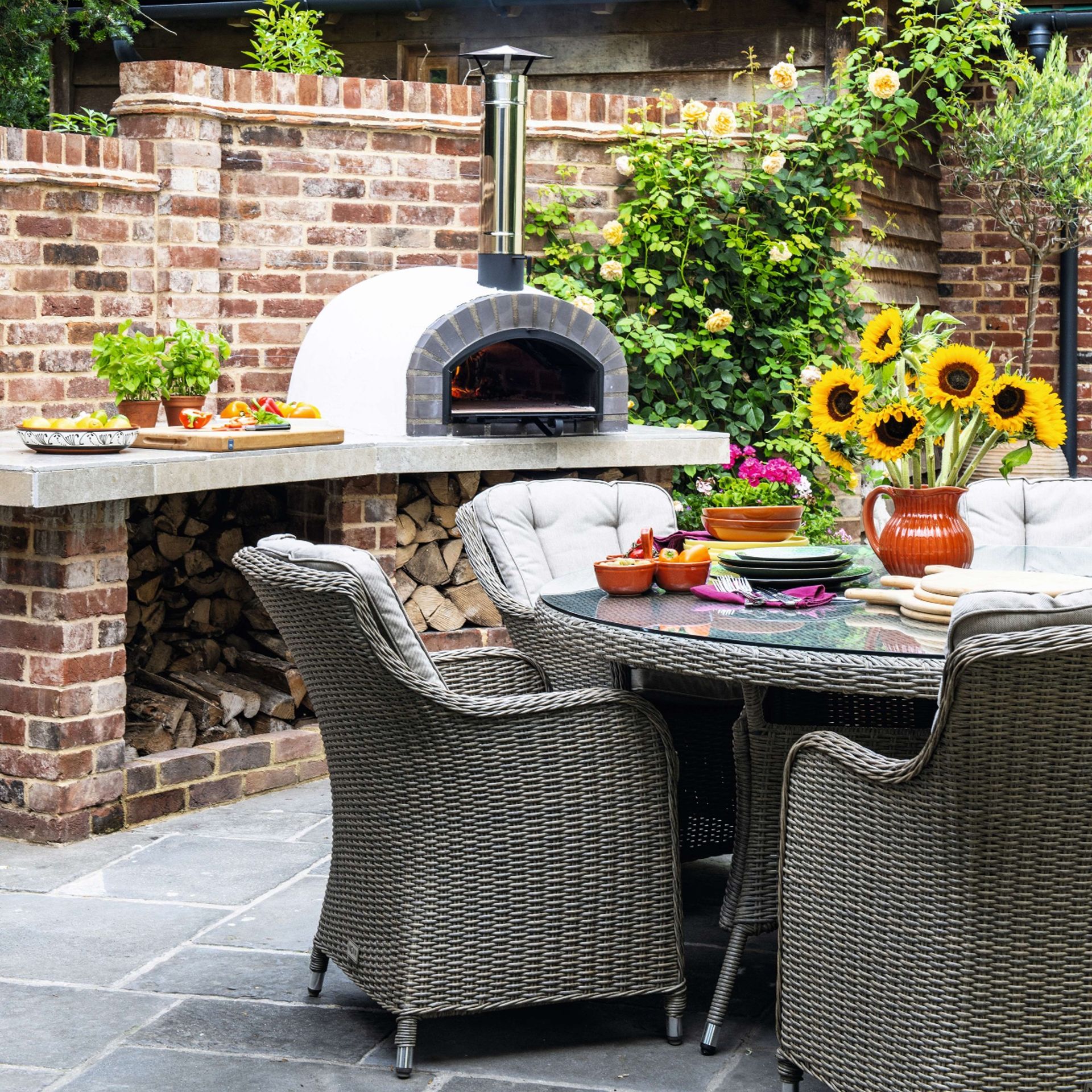 Outdoor pizza oven in outdoor kitchen