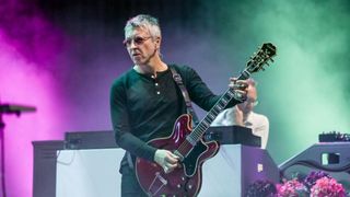 Gem Archer performs live with his Epiphone Sheraton.