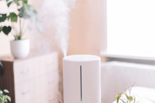 A humidifier in a bedroom