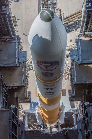 In preparation for launch, the Mobile Service Tower or MST is rolled to its park position at Space Launch Complex-37. ULA's Delta IV rocket is launching the Air Force's ninth Wideband Global SATCOM (WGS-9) satellite.