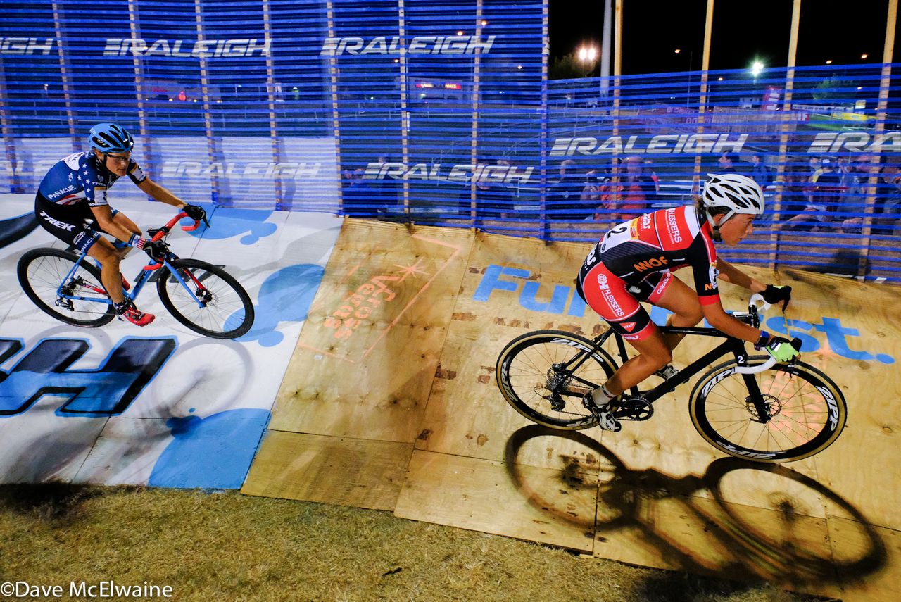 Sophie De Boer leading Katie Compton around the banked track.