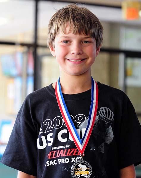 Ben Longenbach with his first place medal in the Cat. 3 men's 11-12-year-old division.
