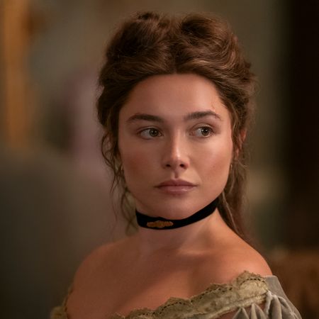florence pugh as cathy ames wearing a choker and green dress off her shoulder in netflix's east of eden